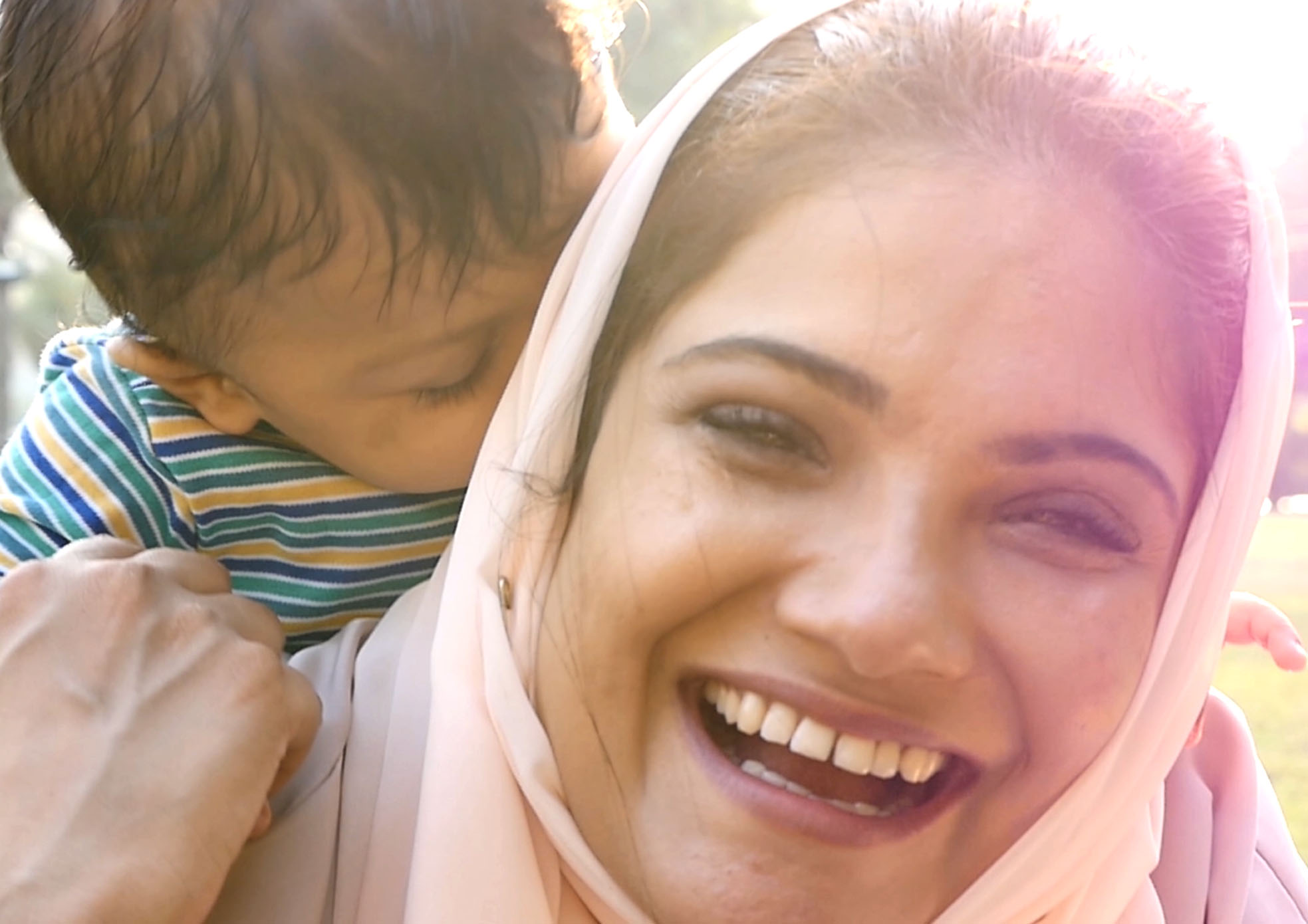 smiling mother with her kid